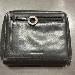 Black Leather Wallet. Slots, Zippers galore! 5”x1.5”x4”.